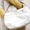 Borsa in vela con manico a spalla