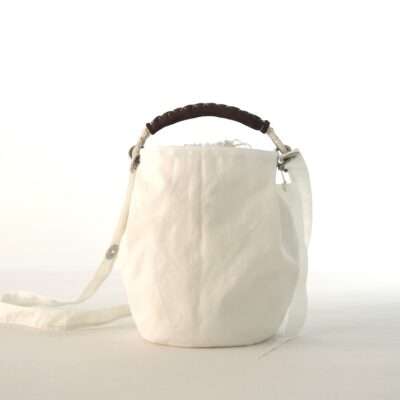 Borsa con tracolla e manico in cotone e pelle